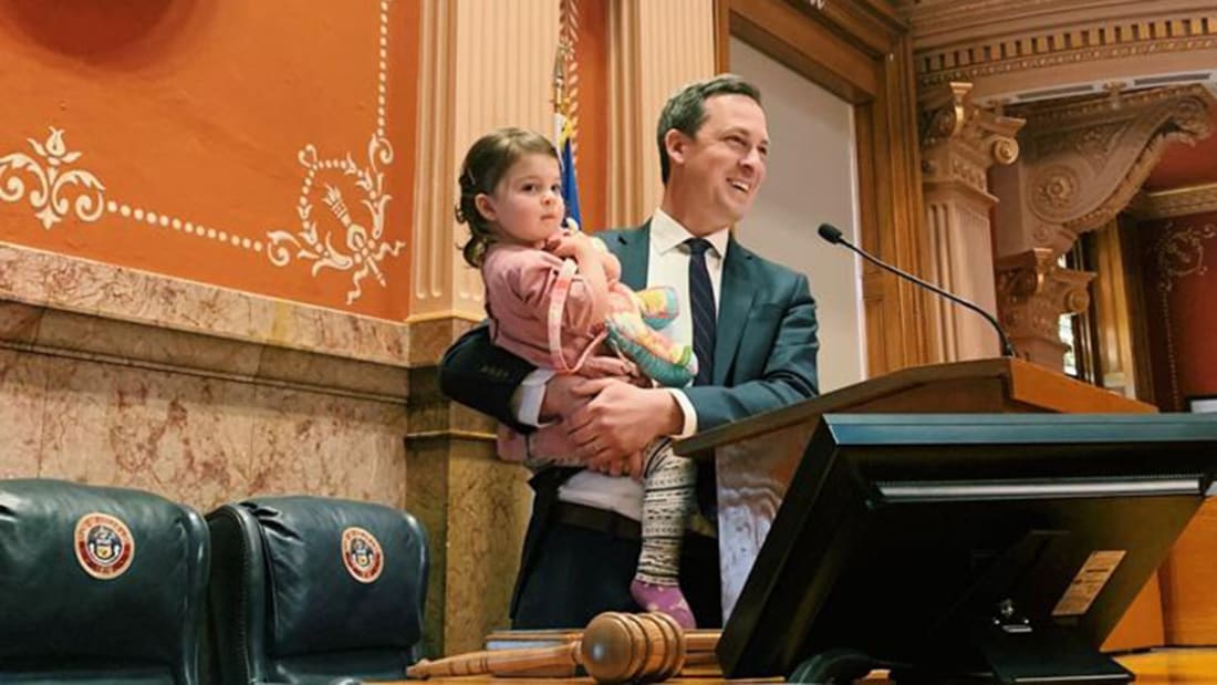 Steve Fenberg holding his daughter