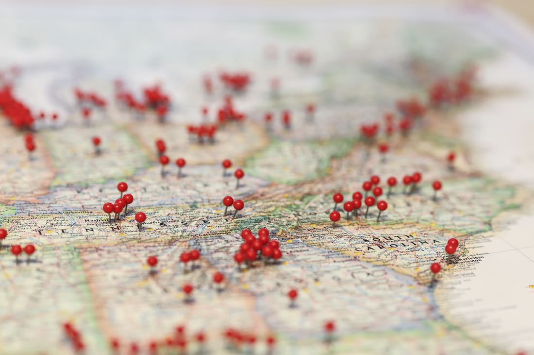 Red pins show locations across a USA map