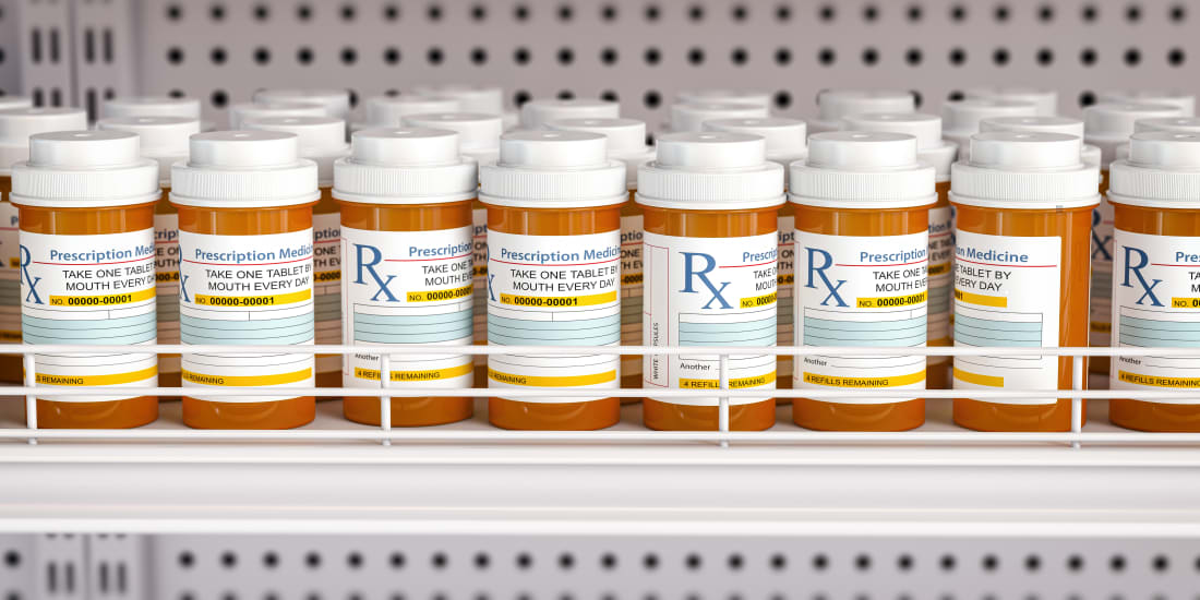 A shelf of various types of prescription drugs