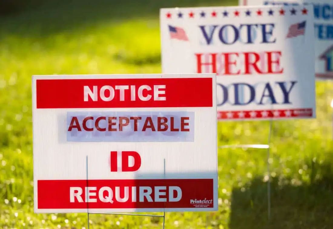 voter ID required signs outside polling place