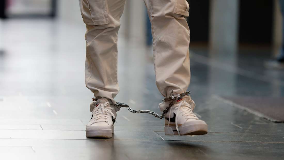 prisoner in shackles