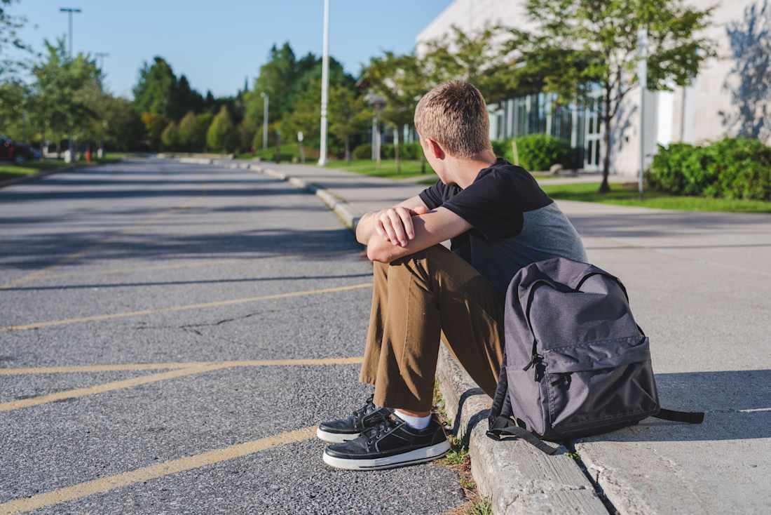 student sitting alone