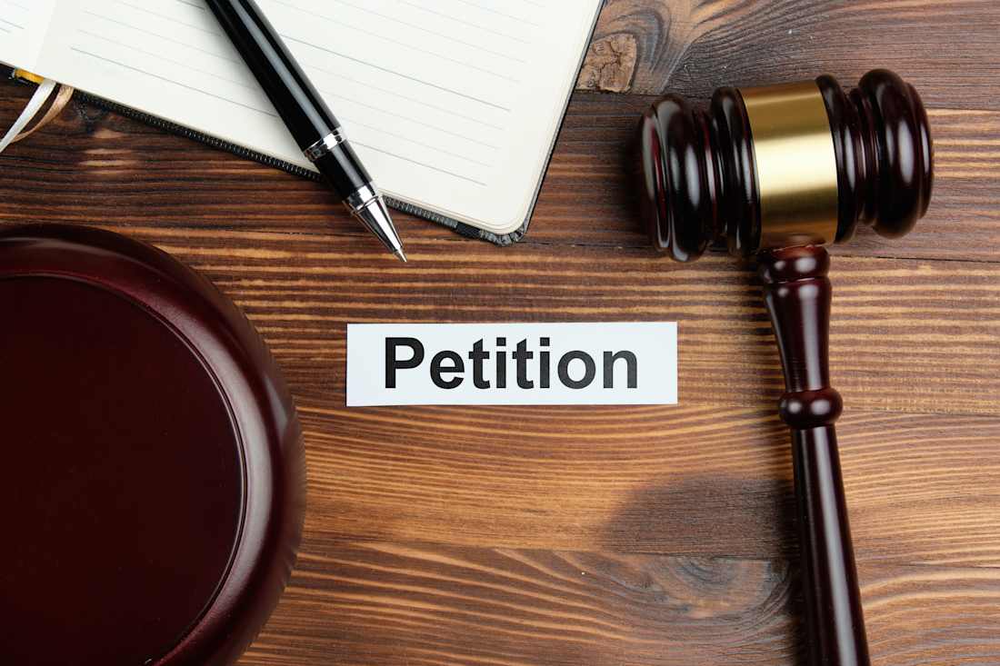 desk with word petition