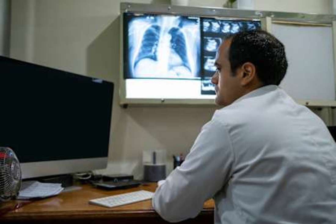 doctor reviewing imaging