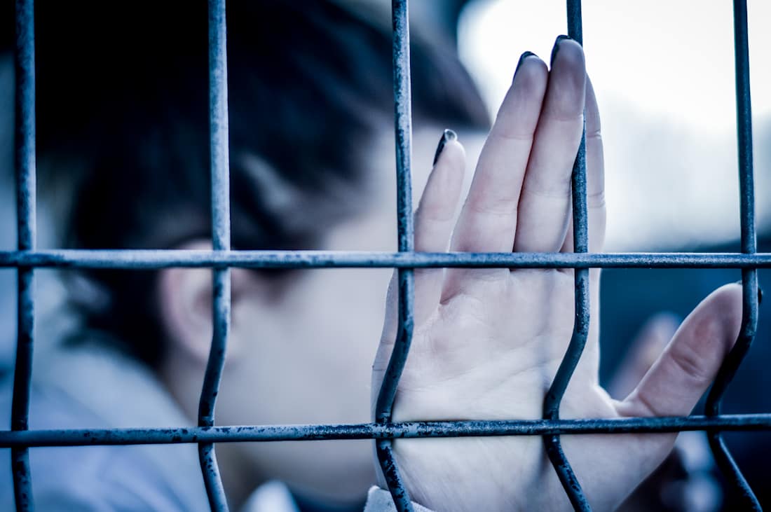youth behind jail bars