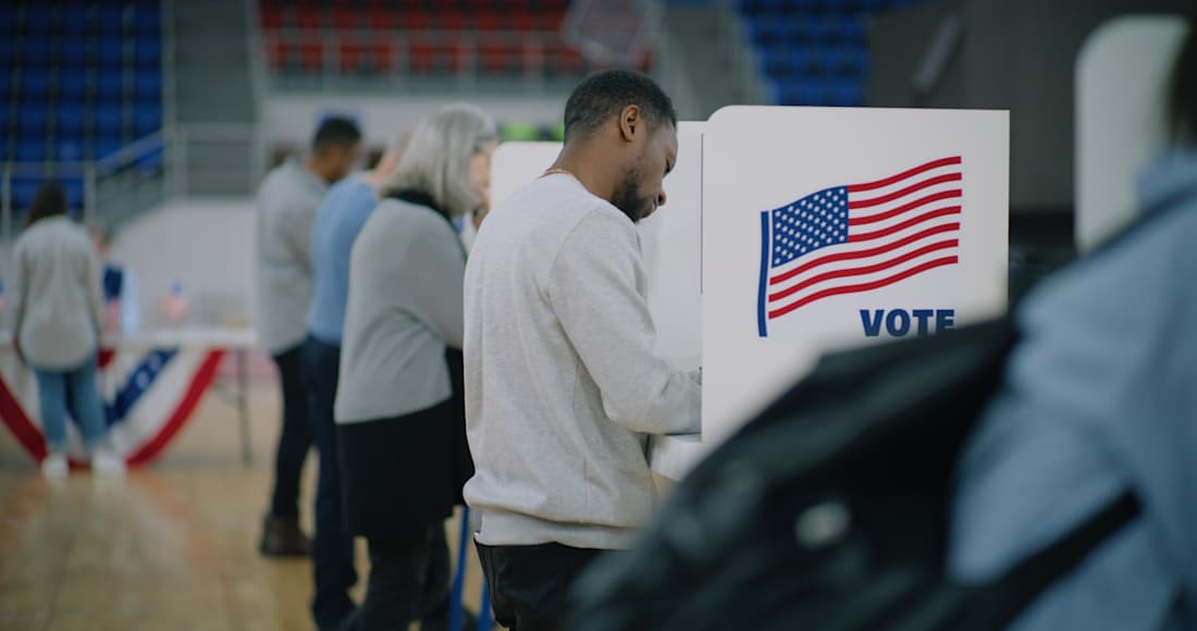 voters voting at booths