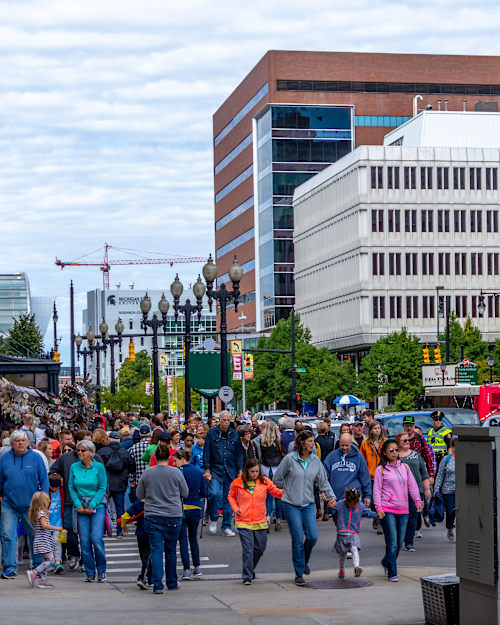 Crowd of people on a street in Grand Rapids during ArtPrize