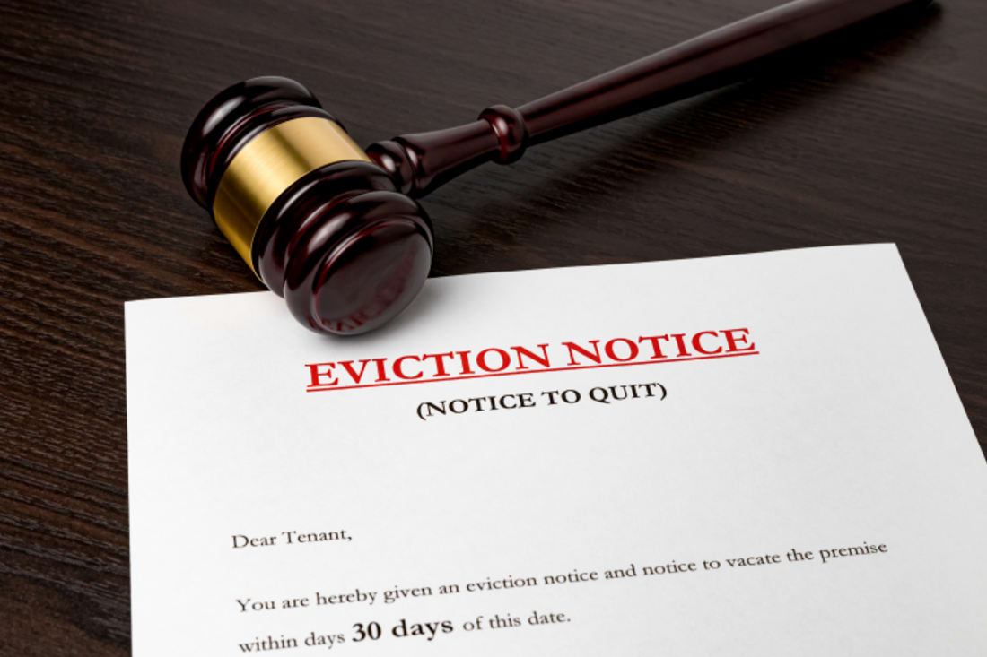 Eviction notice document with gavel.