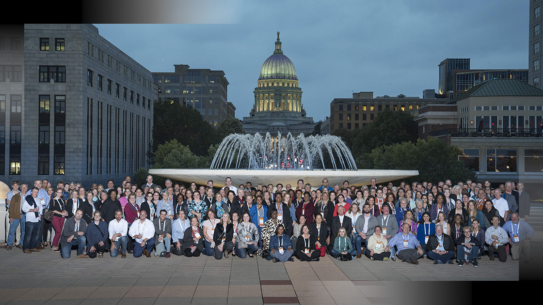 American Society of Legislative Clerks and Secretaries gathered in front of a fountain