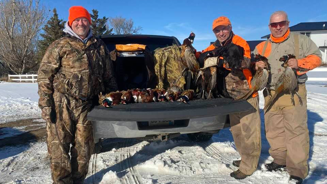 Lee Schoenbeck and friends after a hunt